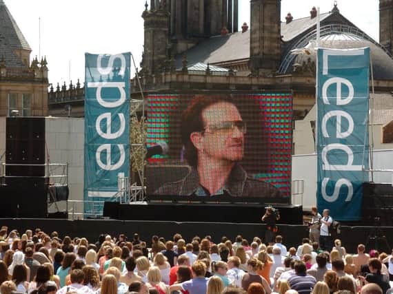 Flashback to Leeds in 2008 when the crowds watched U2 launch the Live 8 show on the giant screen in Millennium Square,