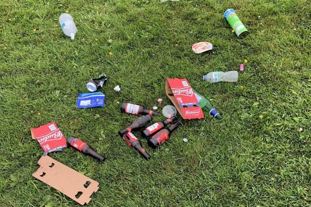 Bins have been left overflowing while rubbish including beer bottles, takeaway boxes and drug paraphernaliahave been abandoned on the grass.