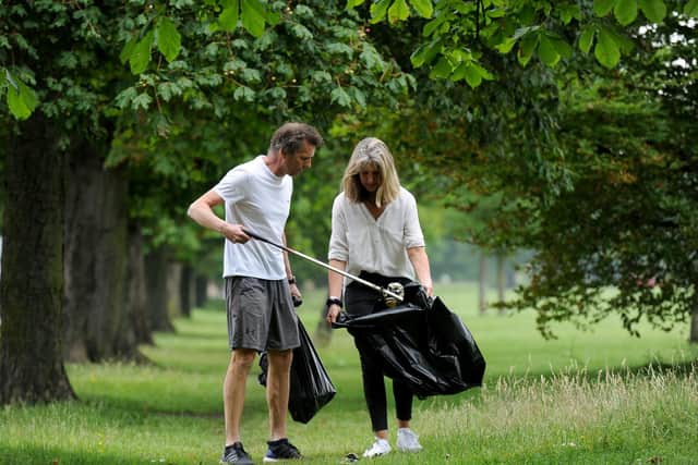 Concerned residents Mike and Liz Lewis from Harrogate who have become unofficial Stray litter pickers. (Picture Gerard Binks)