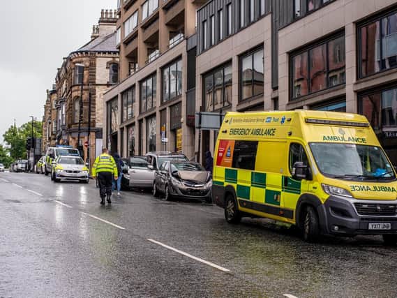 Police and an ambulance attend the incident on Parliament Street in Harrogate. (Picture by Ernesto Rogata)