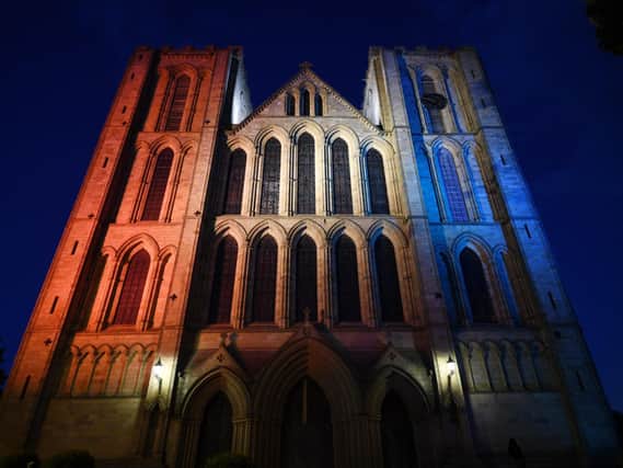 Ripon Cathedral pictured in May when it was lit up for VE Day. Picture: Jonathan Gawthorpe