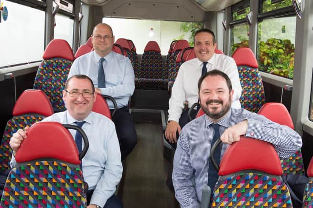 Transdevs new Operations Director Vitto Pizzuti (back row, right) and Commercial Director Paul Turner (back row, left) join the bus operators boardroom team, seen here with Finance Director Mark Dale (front row, left) and CEO Alex Hornby.