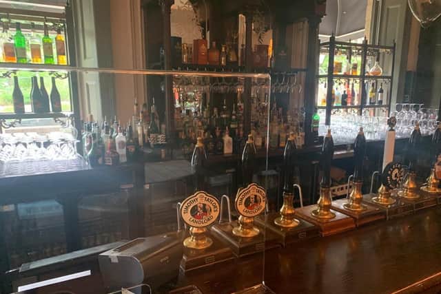 The Fat Badger pub in Harrogate has erected a series of clear screens on the bar to aid with the social distancing regulations.