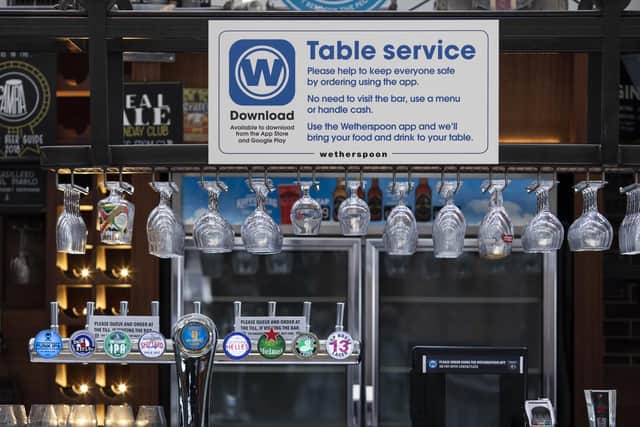 Pubs across the country are looking to introduce payment apps, such as the one currently used in Wetherspoons as they prepare to reopen this weekend. Picture: Getty Images.