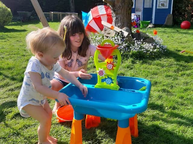 The grandchildren of Gillian Wass who is buying community shares in Long Lands Common in Harrogate because she is passionate about connecting her grandchildren with nature.