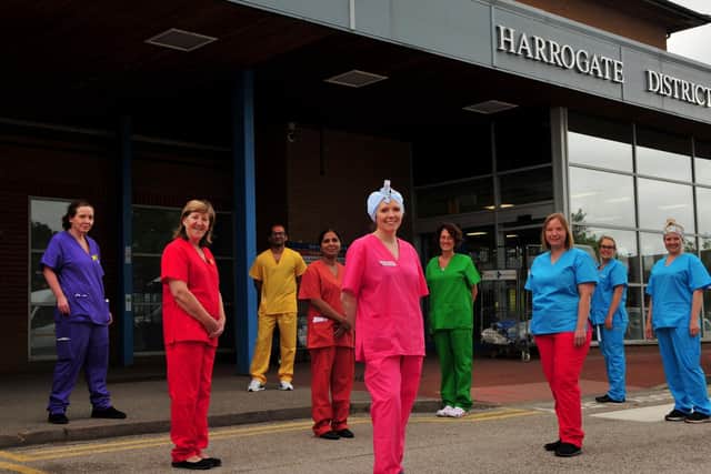 Harrogate hospital staff dressed in rainbow scrubs donated by Harrogate Scrubbers.