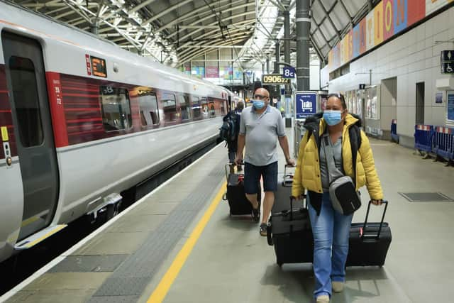 Rail passengers at Leeds station. Pic: PA