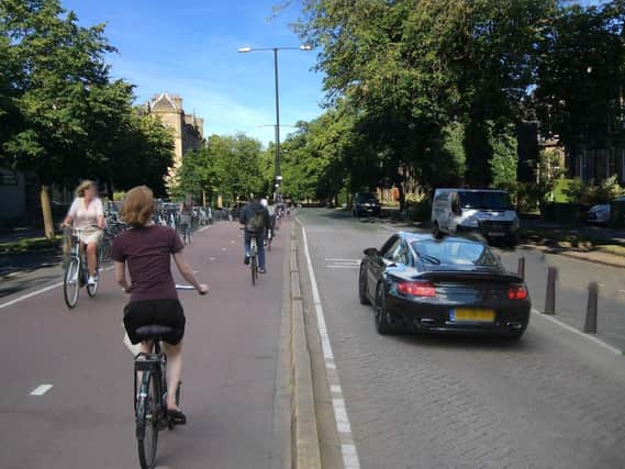 A vision of as greener Harrogate where cars don't rule the road - A visualisation of new, wide, safe bicycle lanes in Harrogate created by Zero Carbon Harrogate.