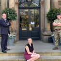 Accolade for the HRH Group of hotels in Harrogate - Simon Cotton, Fran Patrick and an MOD representative outside the White Hart Hotel in Harrogate.