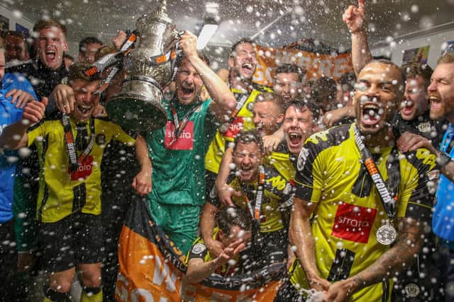 Town players and staff celebrate their 3-0 National League North play-off final win over Brackley in May 2018. Picture: Matt Kirkham