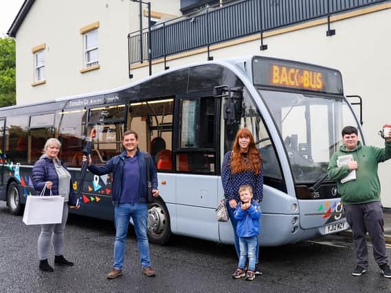 Four typical customers, representing a shopper, commuter, family and student celebrate getting back to the bus as  The Harrogate Bus Company unveils a poll of its customers showing an overwhelming majority are ready to return to bus travel.
