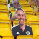 The CNG stadium is filled with cut-outs of supporters.