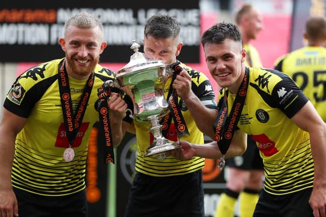 George Thomson, Josh Falkingham and Ryan Fallowfield with the play-off winners' trophy.