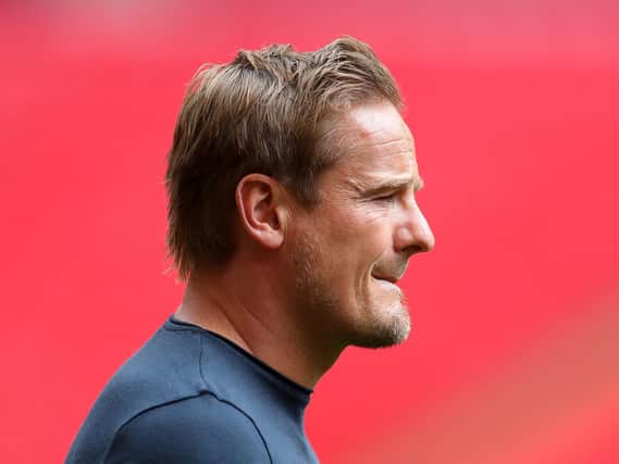 Neal Ardley watches on at Wembley as his Notts County side are put to the sword by Harrogate Town. Pictures: Getty Images.