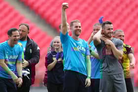 Harrogate Town's manager Simon Weaver celebrates after his team's victory in the Vanarama National League play off final at Wembley Stadium.