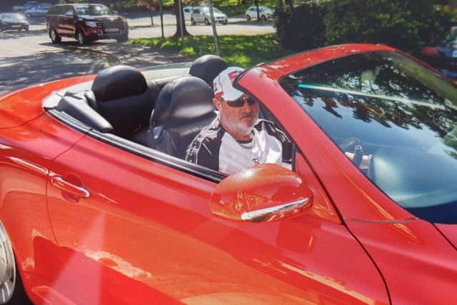 Keiran in his red Lexus coupe, which he was driving at the time of the collision.