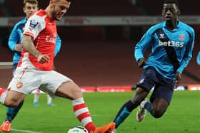 Joel Taylor, right, closes down Jack Wilshere during a clash between Stoke City under-21s and Arsenal under-21s. Picture: Getty Images
