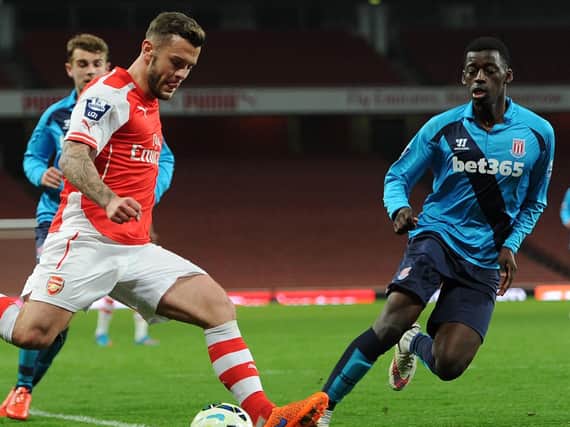 Joel Taylor, right, closes down Jack Wilshere during a clash between Stoke City under-21s and Arsenal under-21s. Picture: Getty Images