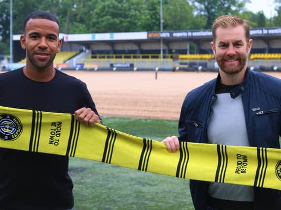 Kevin Lokko at the CNG Stadium with Harrogate Town manager Simon Weaver.