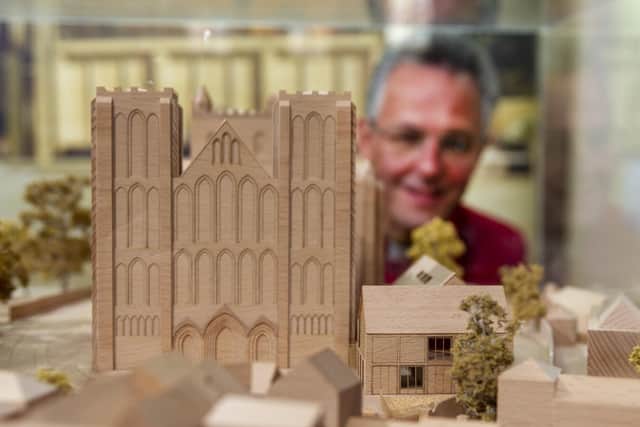 The Dean of Ripon, the Very Rev John Dobson, looks at an architect's model for proposed extension plans at Ripon Cathedral. Picture Tony Johnson