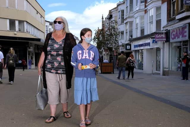 Scarborough shoppers wearing their face masks while out and about - North Yorkshire Police have yet to issue any fines.