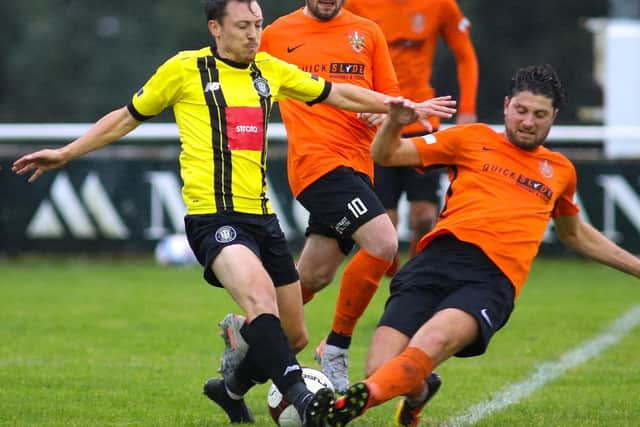 Jack Emmett gets stuck in during Town's midweek draw at Brighouse Town.