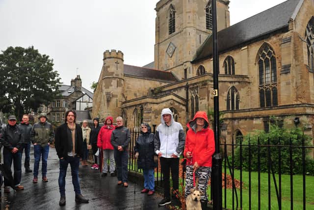 Some of the Harrogate residents concerned about St Mary's Church - Matthew Weller (middle) with Mark Wilson, Nick Cape, Joan Mallon, Lauren Ball, Hedley Hilton, John Cooper, Rachel Ogden, Cormac Flaningan, Sophie Bland, Adam Ball and Nico the dog.