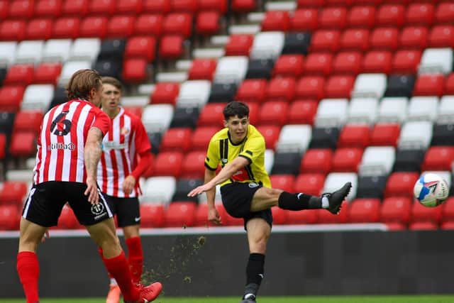 Town midfielder Connor Kirby lets fly at the Sunderland goal.