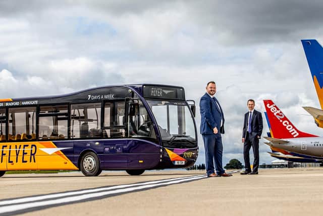 Launching the new Flyer bus network at Leeds Bradford Airport, Transdev CEO Alex Hornby (left) and Charles Johnson, Head of Planning and Development at Leeds Bradford Airport.
