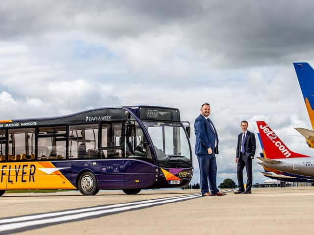Launching the new Flyer bus network at Leeds Bradford Airport, Transdev CEO Alex Hornby (left) and Charles Johnson, Head of Planning and Development at Leeds Bradford Airport.