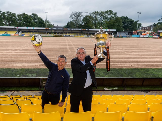 Exciting new deal- Andy Makin, sponsors EnviroVent's managing director celebrates the announcement at Wetherby Road with Garry Plant, managing director of Harrogate Town - and the league trophy!
