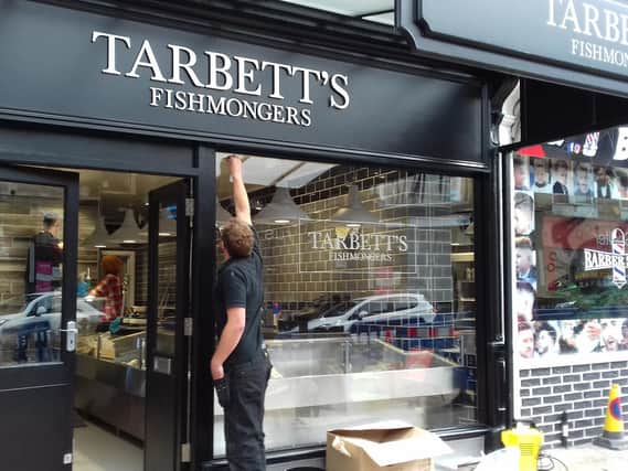 Putting the final touches to the new Tarbett's fishmongers in Harrogate, part of Yorkshire's largest independent fish retailers.