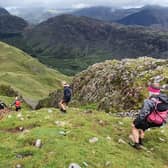 Harrogate Harriers fell runner Helen Price descending a gulley in the Lake District during the Joss Naylor Challenge. (Picture by Simon Franklin)