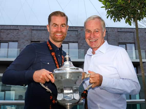 Simon and Irving Weaver with the National League play-off final winners' trophy. Pictures: Matt Kirkham