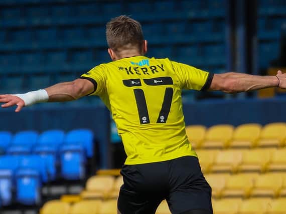 Lloyd Kerry celebrates after netting Harrogate Town's second goal against Southend United with a powerful strike from outside the box. Pictures: Matt Kirkham