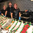 Pictured at Tarbett's Fishmongers are, from left, Rhosian Johnson, Liam Tarbett and Sharon Tarbett. Picture: Gerard Binks