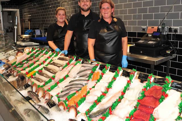 Pictured at Tarbett's Fishmongers are, from left, Rhosian Johnson, Liam Tarbett and Sharon Tarbett. Picture: Gerard Binks