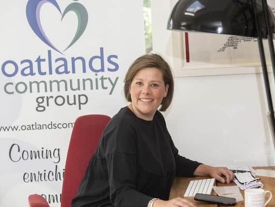 Victoria at her desk for Oatlands Community Group