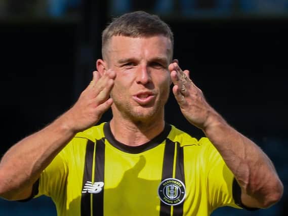Jack Muldoon celebrates after opening the scoring for Harrogate Town as they beat Southend United in their first-ever League Two outing. Pictures: Matt Kirkham