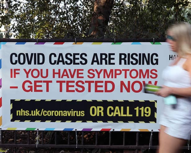 A public information sign warning of rising Covid-19 cases in London after Prime Minister Boris Johnson announced a range of new restrictions to combat the the coronavirus outbreak in England. Photo: PA
