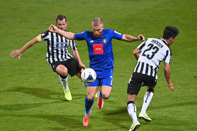 George Thomson gets on the ball during Tuesday's FA Trophy semi-final clash at Meadow Lane.