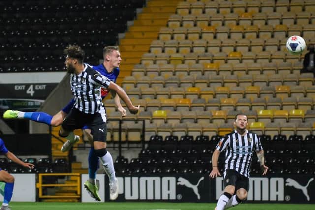 Will Smith heads home Town's winner in Tuesday night's FA Trophy semi-final success at Notts County.