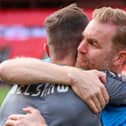 Simon Weaver, right, celebrates with James Belshaw at Wembley Stadium following Harrogate Town's National League play-off final win over Notts County. Picture: Matt Kirkham
