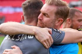 Simon Weaver, right, celebrates with James Belshaw at Wembley Stadium following Harrogate Town's National League play-off final win over Notts County. Picture: Matt Kirkham