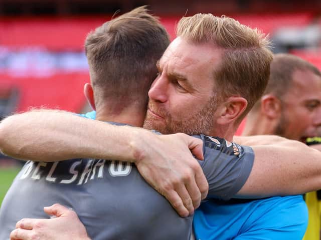Simon Weaver, right, celebrates with James Belshaw at Wembley Stadium following Harrogate Town's National League play-off final win over Notts County. Picture: Matt Kirkham