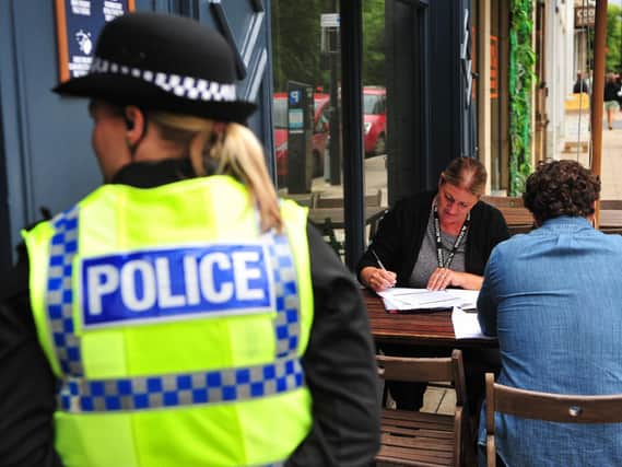 North Yorkshire Police Licencing Officer Jackie Allen is pictured in the summer working with Harrogate Borough Council checking the pubs are playing by the rules. (Picture Gerard Binks)