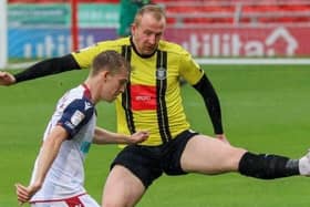 Mark Beck in action for Harrogate Town during Saturday's League Two defeat to Bolton Wanderers. Picture: Matt Kirkham