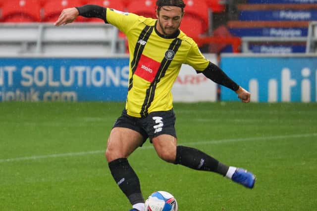 Dan Jones was handed his first start in Town colours when the Trotters visited the Keepmoat Stadium.