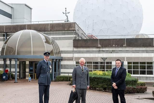 His Royal Highness the Prince of Wales outside the Operations Building with Sqn Ldr Geoff Dickson, RAF Cdr, RAF Menwith Hill.