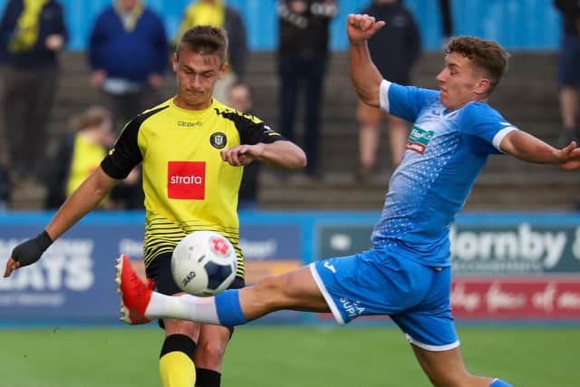 Will Smith in action against Barrow during the last meeting between the sides, back in August 2019. The Town centre-half scored twice in a 3-0 success. Picture: Matt Kirkham